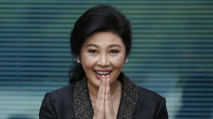 英拉退台后泰国现在的总理是谁_泰国前女总理英拉被判无罪_秦国漂亮女总理英拉裸体照片